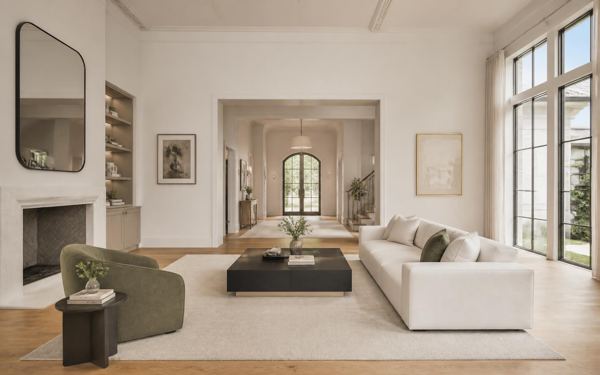 Freshly painted minimalist living room with warm white walls and sage accents